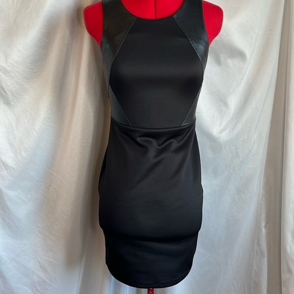 Suzy Shier Dresses & Skirts - XS10 Suzy shein sleeveless leather like detailed dress